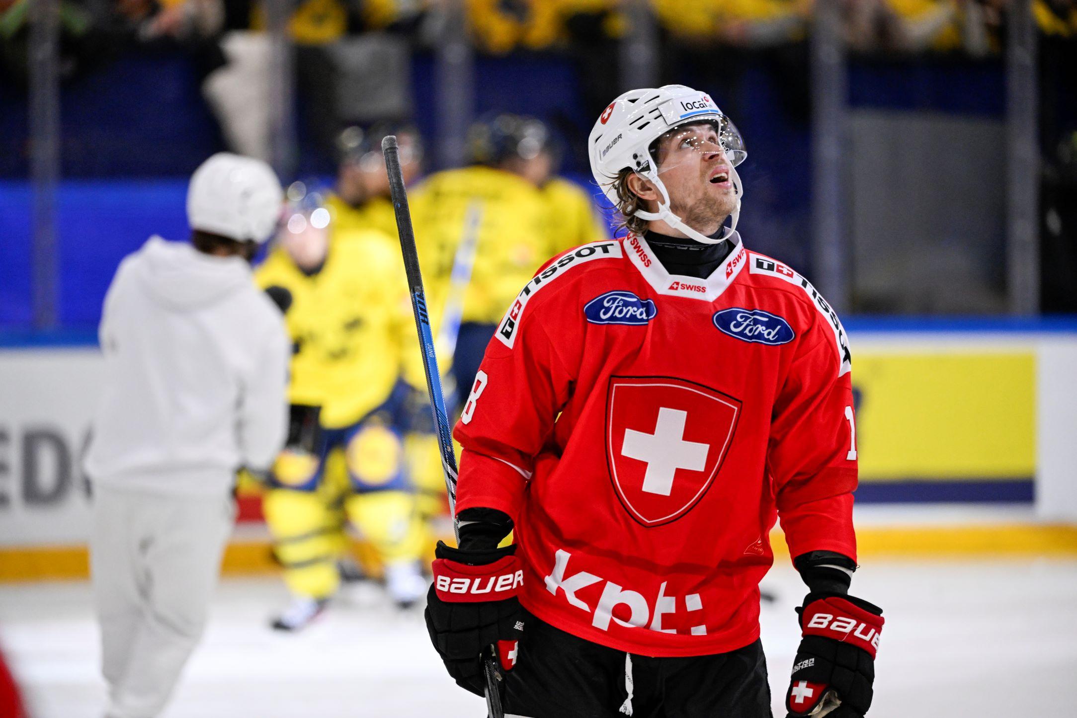 Keystone_SDA_Fragender Blick nach oben_ Was bringt die Euro Hockey Trophy der Schweiz wirklich